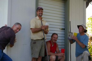 Alan Bradshaw, owner of Idaho Wood Sheds (yellow shirt) and "his" engineers, Greg pushing shed on left, Chris in red shirt, my dad on far right