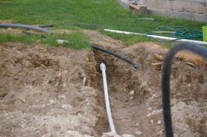 yard water supply being buried deeper and sprinklers getting re-routed