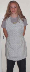 Curly Que modeling McCall apron 6092 that she received for Christmas last year