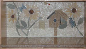 birdhouse and butterfly part of tile mosaic