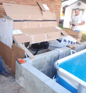 temporary cardboard insulation for the pool equipment