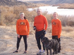 the girls are wearing their shirts from the Lifetime Fitness Turkey Day Run in Boise the Thursday before