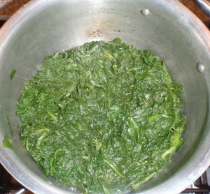 fresh spinach cooks down like snow melts to water
