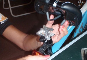 That top bracket tends to swivel right into the position to hold the bike saddle on, even after the saddle is removed.