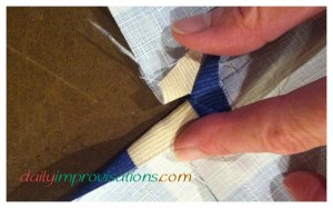 I stopped the seams about 1/2 inch from the edge so that it would be smoother sewing the side panels together as a box.