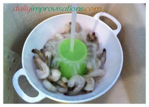 A quick, DIY fountain for thawing frozen shrimp. There are only about 40 shrimp in the colander when I took the photo, but then two other people showed up for dinner and I added about 20 more frozen ones. They all thawed promptly.