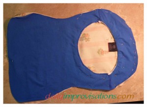 You cannot see the ribbing here because it is tucked under so that it will be on the outside when the bib is turned right sides out.