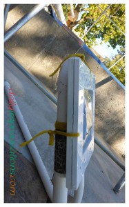 A side view of how the two plastic frames hold the plastic and are tied to the PVC pipe frame.