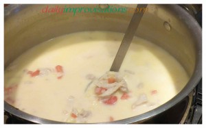 Mexican Chicken Corn Chowder at its creamy finish, partly held up in a ladle so you can see better how hearty it is!