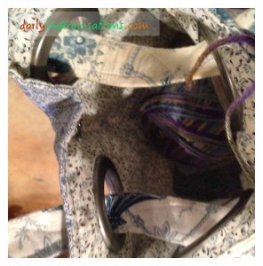 Here is the yarn in bag that is hanging on the handles.