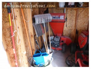 The not often used chipper and snow shovels in a back corner.