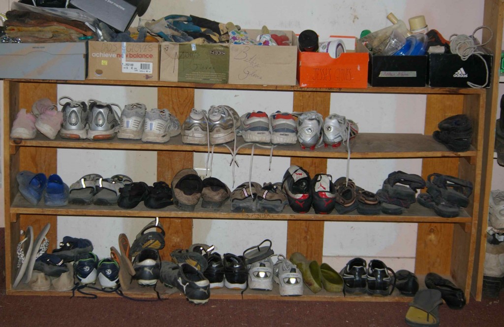 shoe shelf in garage needs a re-organziation